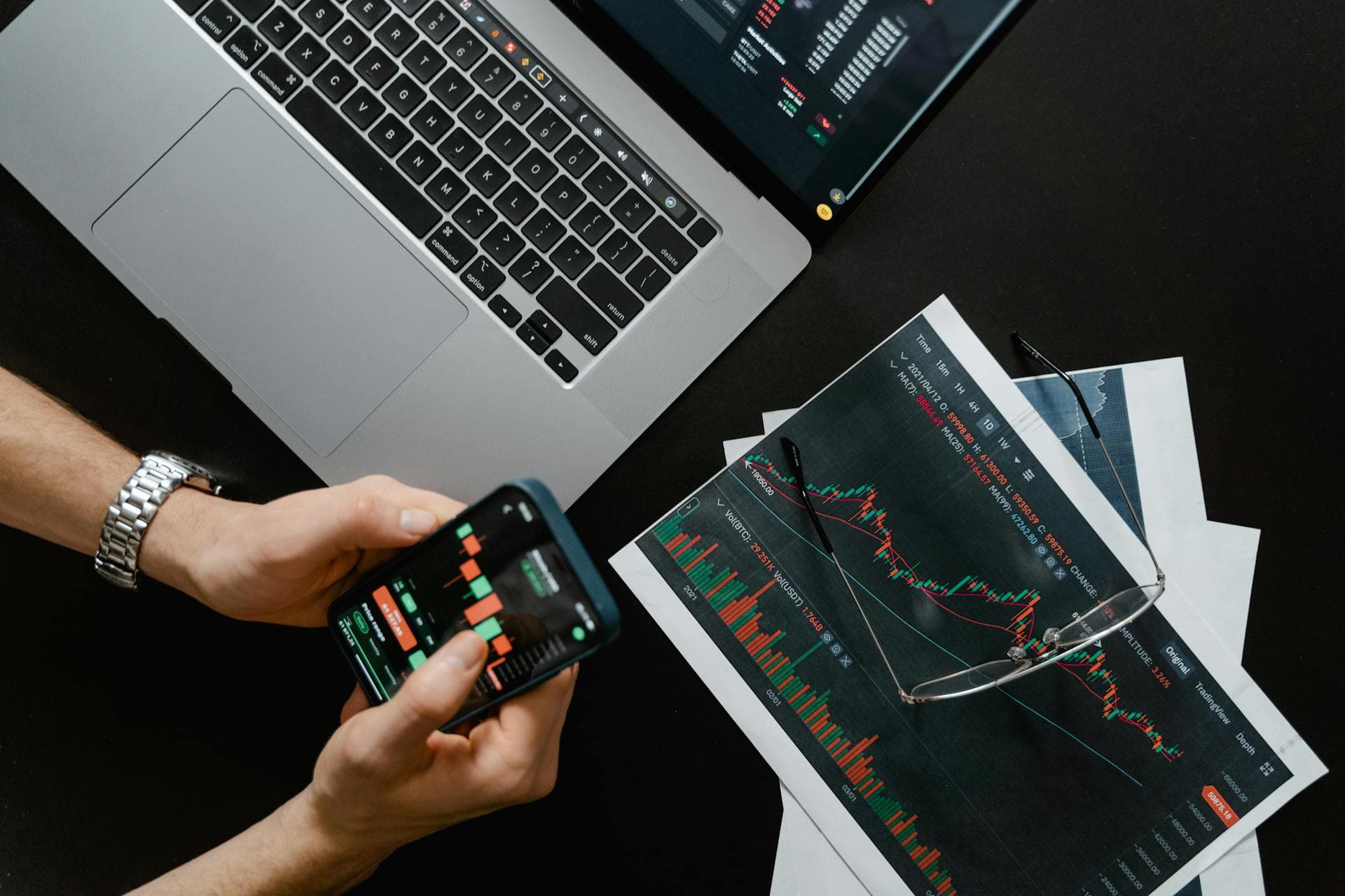 Business owner reviewing financial statements with valuation metrics